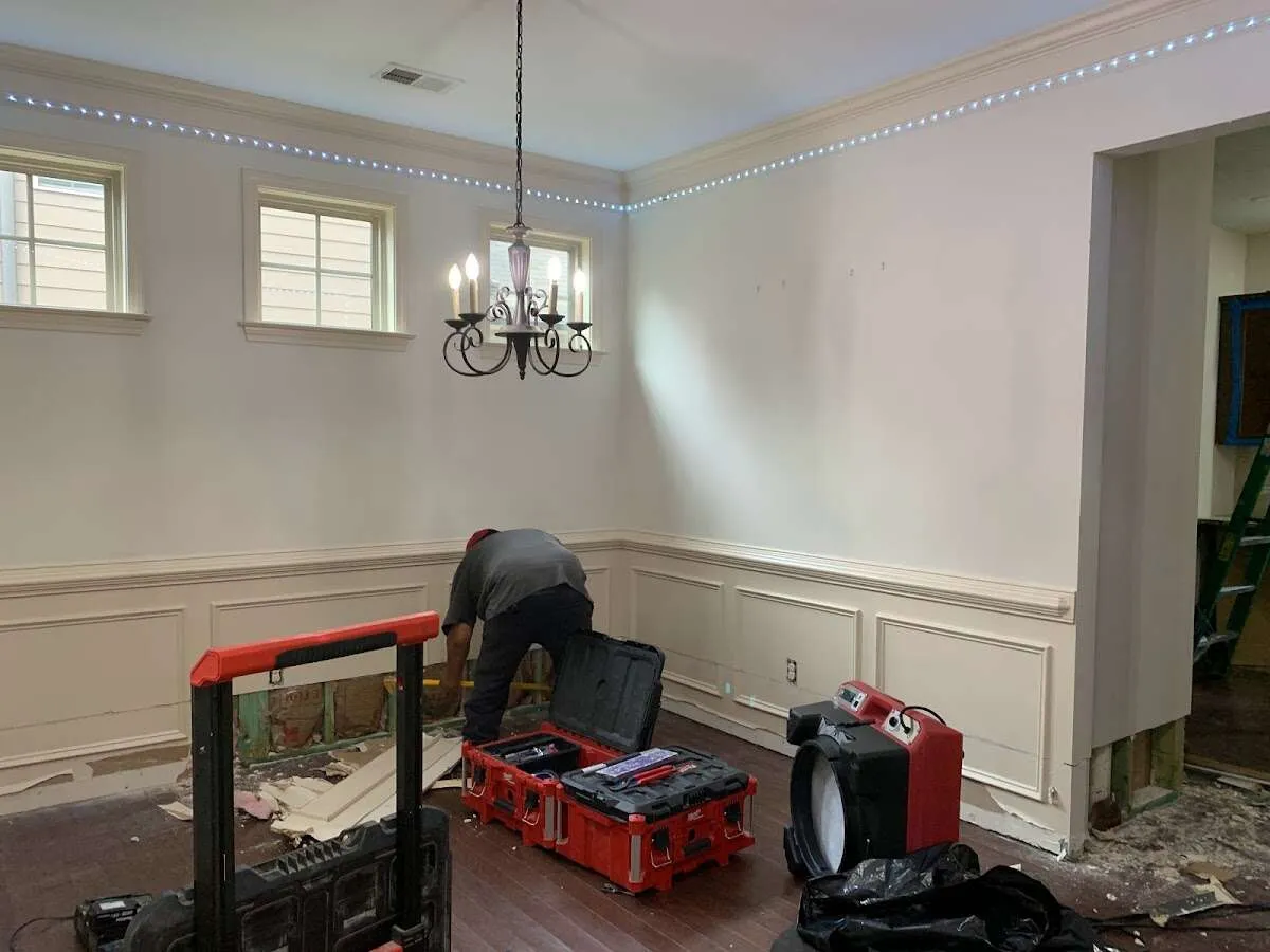 Restoration technician with professional equipment in Leesburg